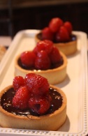 Raspberry chocolate ganache tarts at Blue Dog Bakery